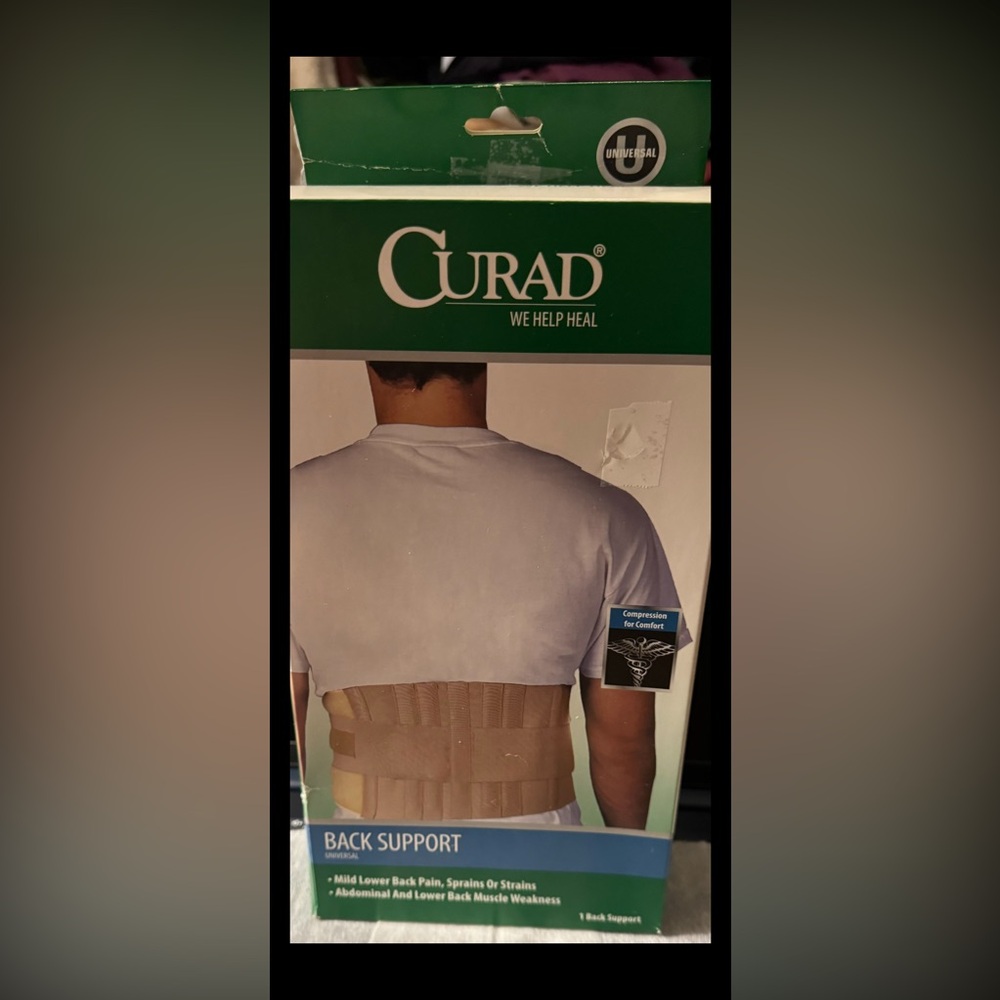 Never Used, Unopened, CURAD Universal Back Support, box not in mint condition.